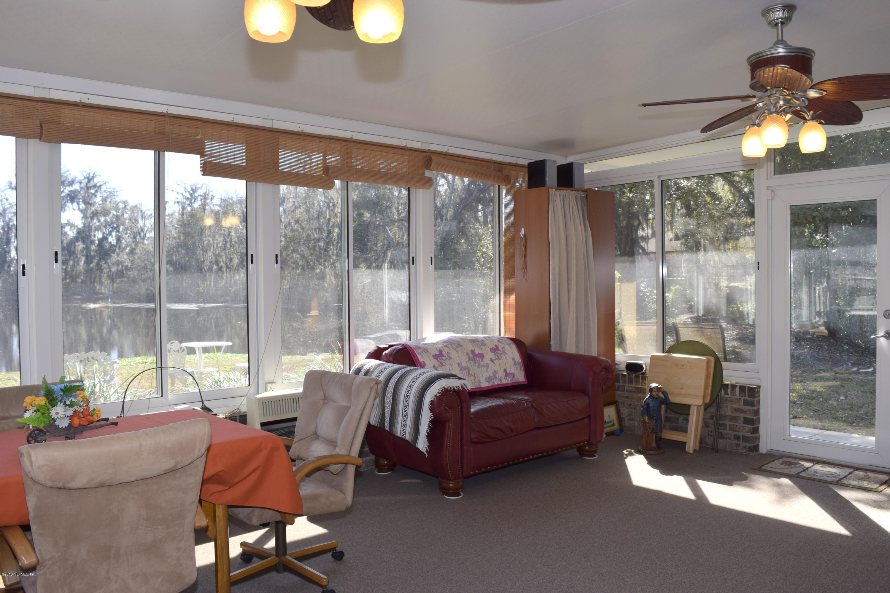 3569 Sheldon Road Orange Park, FL 32073 - Photo 42 of 85 glass enclosed sunroom