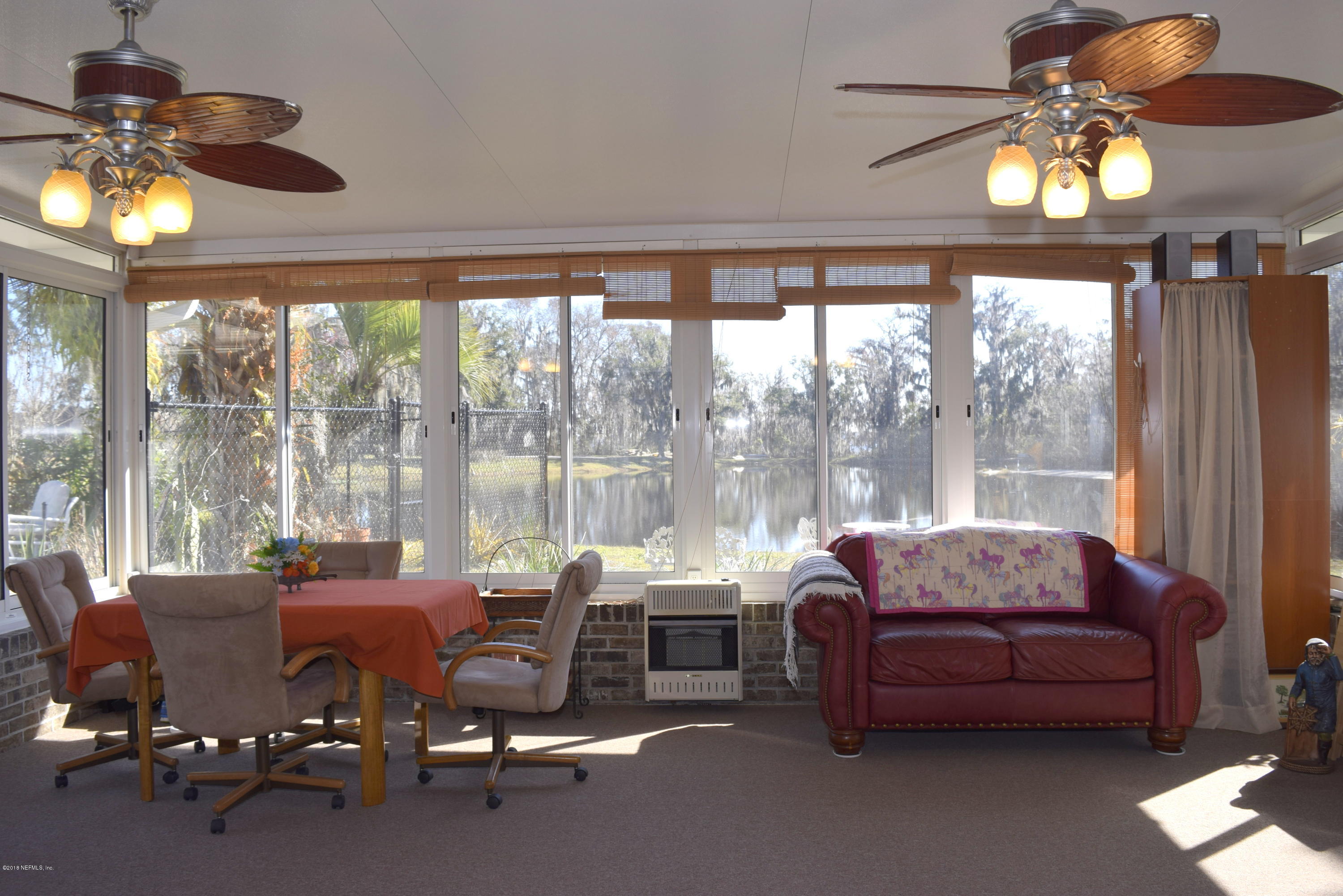 3569 Sheldon Road Orange Park, FL 32073 - Photo 43 of 85 view of pond from sunroom