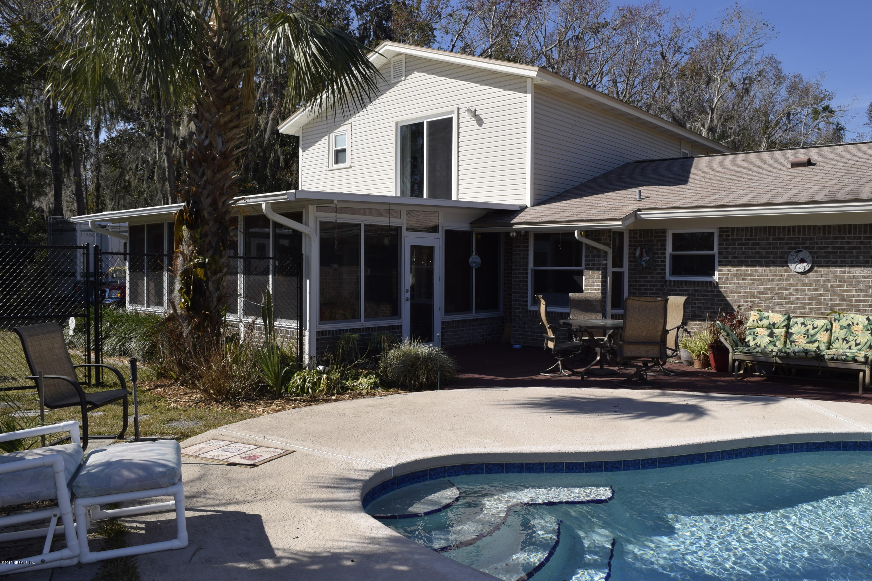 3569 Sheldon Road Orange Park, FL 32073 - Photo 69 of 85 sunroom from pool