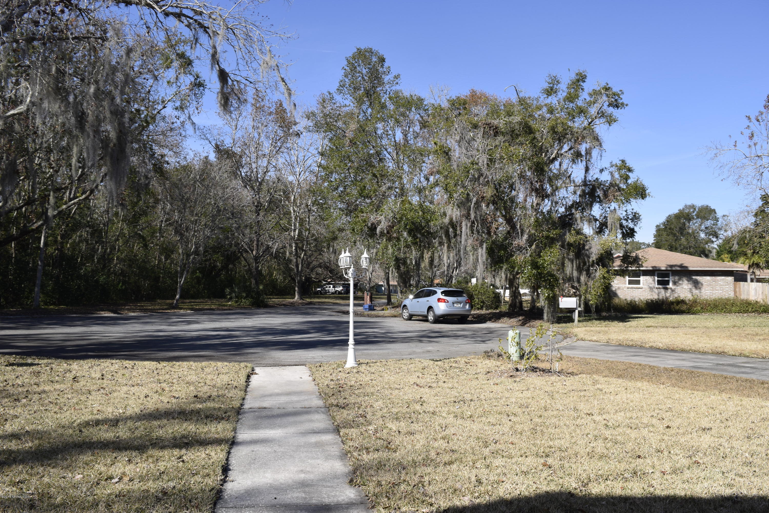 3569 Sheldon Road Orange Park, FL 32073 - Photo 9 of 85 sidewalk to front door