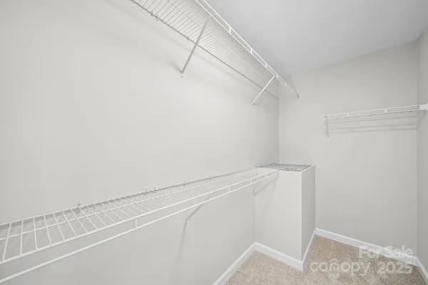 a view of small space with racks on the wall