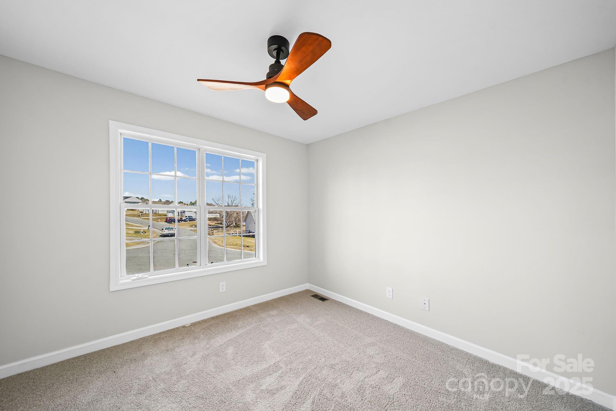 1562 Piney Church Road Concord, NC 28025 - Photo 30 of 40 a view of an empty room and window