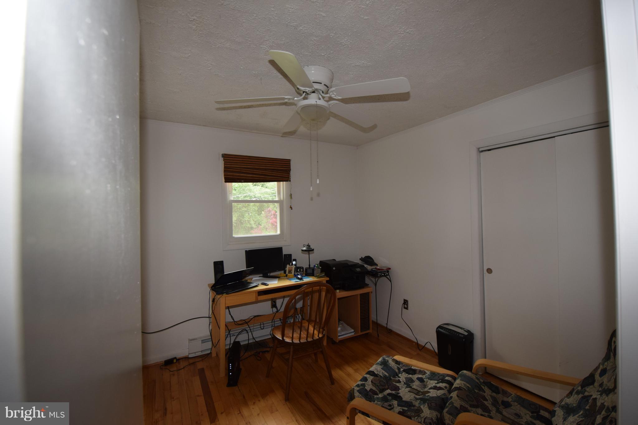 4836 Teen Barnes Road Frederick, MD 21703 - Photo 22 of 29 a view of a workspace with furniture and a window