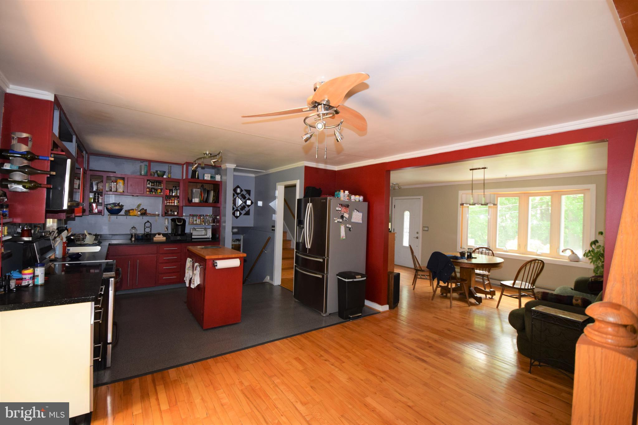 4836 Teen Barnes Road Frederick, MD 21703 - Photo 8 of 29 a living room with lots of furniture and kitchen view