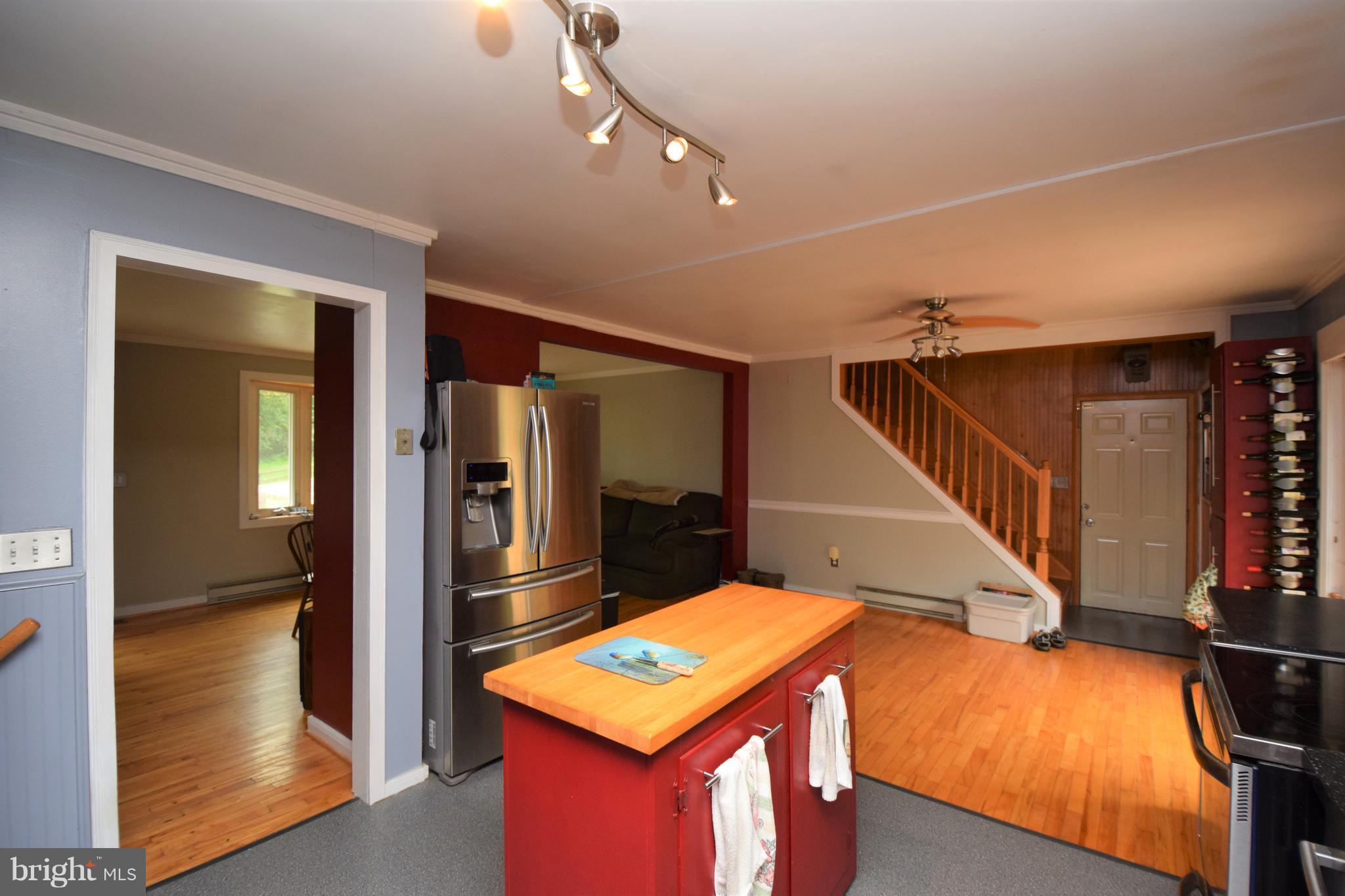 4836 Teen Barnes Road Frederick, MD 21703 - Photo 9 of 29 a room with table and chairs