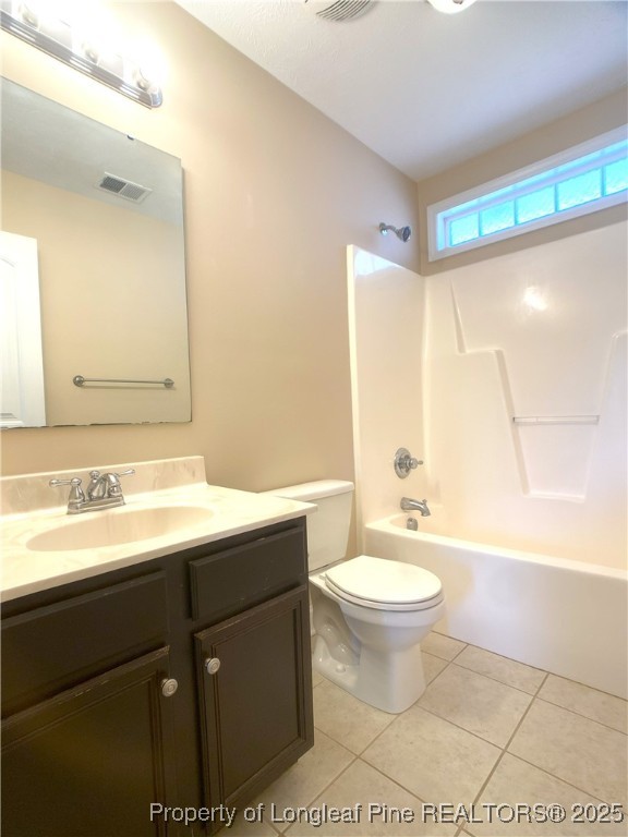 401 Regimental Drive Cameron, NC 28326 - Photo 27 of 35 a bathroom with a double vanity sink toilet mirror and shower