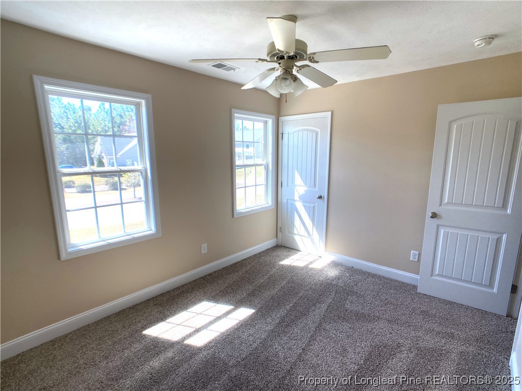 401 Regimental Drive Cameron, NC 28326 - Photo 29 of 35 a view of an empty room with a window