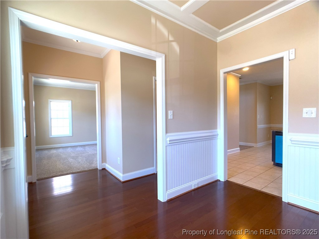 401 Regimental Drive Cameron, NC 28326 - Photo 3 of 35 a view of a hallway with wooden floor