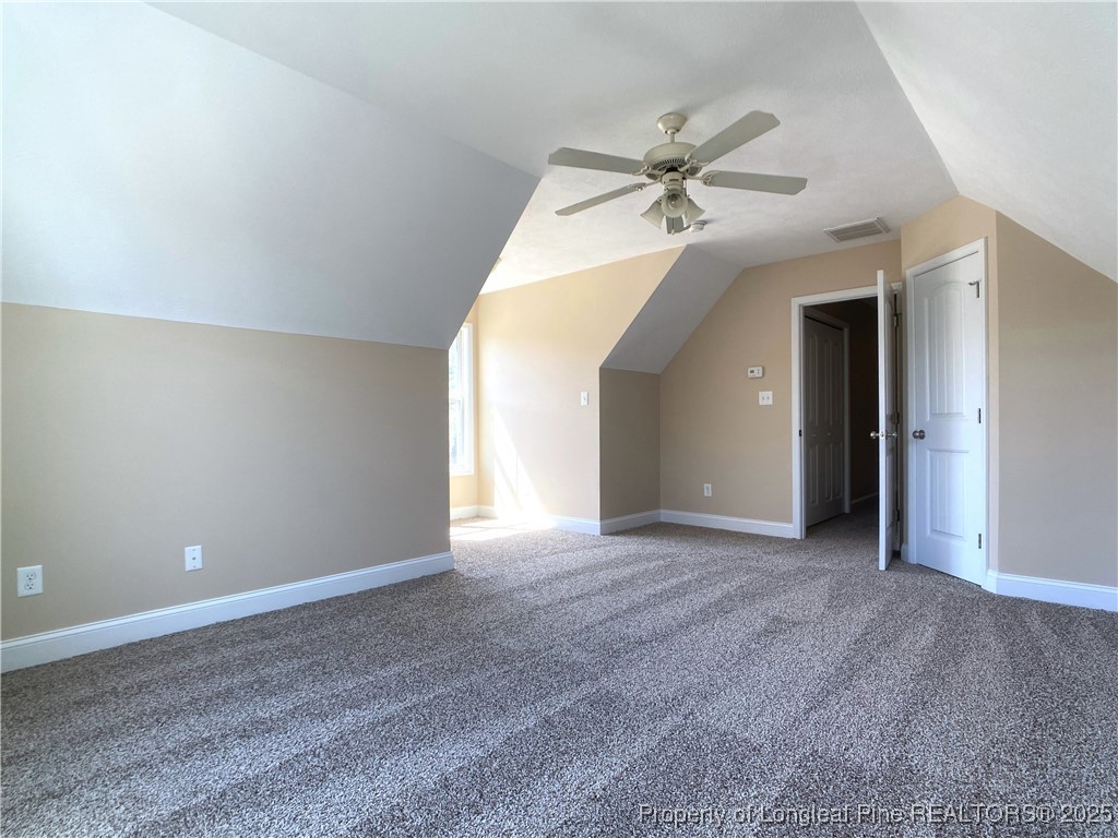 401 Regimental Drive Cameron, NC 28326 - Photo 31 of 35 a view of a livingroom with a ceiling fan and window