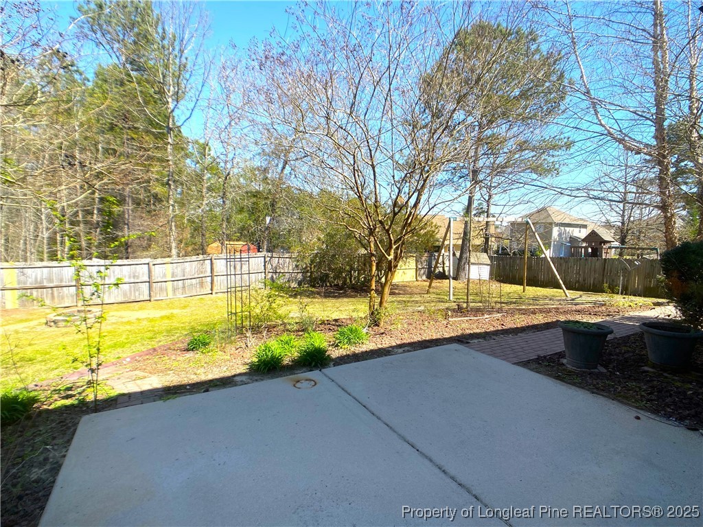 401 Regimental Drive Cameron, NC 28326 - Photo 33 of 35 a view of swimming pool with outdoor seating and yard
