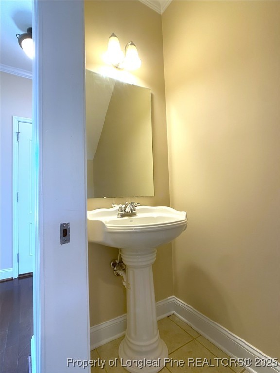 401 Regimental Drive Cameron, NC 28326 - Photo 10 of 35 a bathroom with a sink and mirror