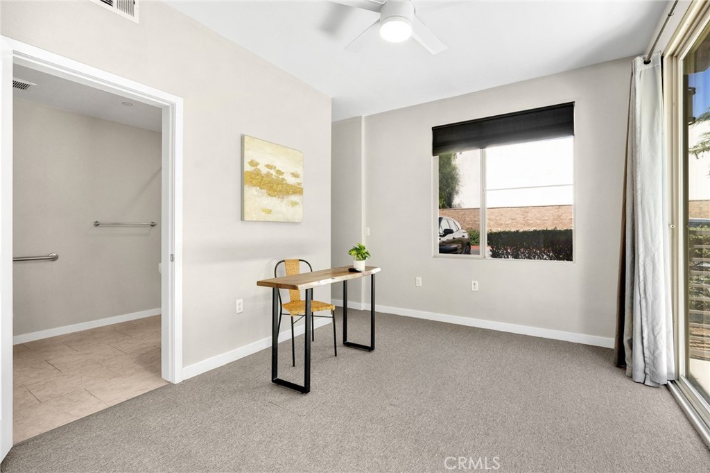 746 Farrier Way Upland, CA 91786 - Photo 18 of 45 a view of a workspace with furniture and a window