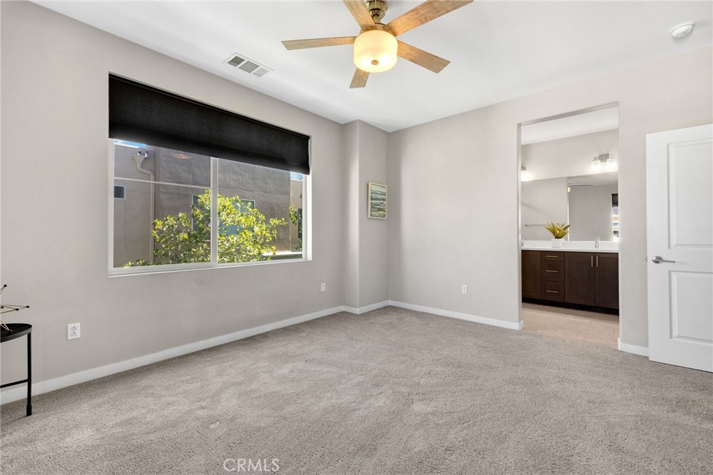 746 Farrier Way Upland, CA 91786 - Photo 24 of 45 an empty room with windows and closet