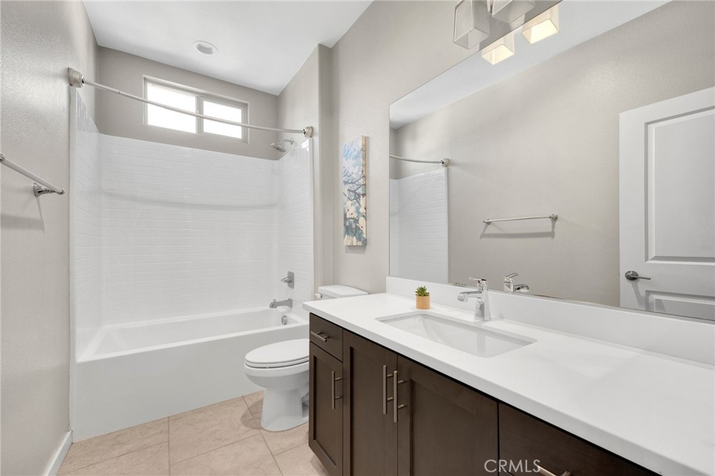 746 Farrier Way Upland, CA 91786 - Photo 31 of 45 a bathroom with a sink a toilet and shower