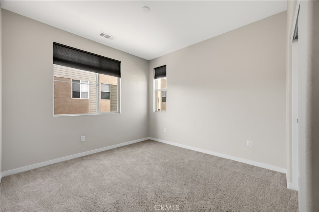 746 Farrier Way Upland, CA 91786 - Photo 33 of 45 a view of an empty room with a window