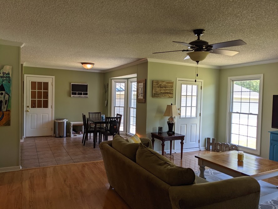 6 Power Station Road Taft, TN 38488 - Photo 13 of 29 a living room with furniture and a dining table