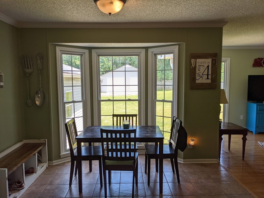 6 Power Station Road Taft, TN 38488 - Photo 18 of 29 a view of a dining room with furniture and wooden floor