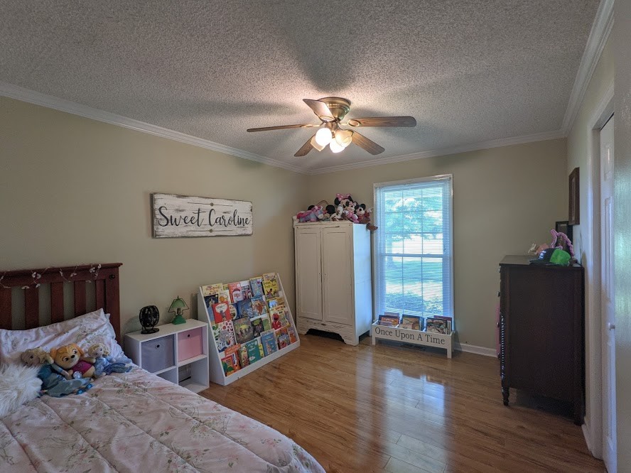 6 Power Station Road Taft, TN 38488 - Photo 24 of 29 a living room with furniture stairs and a window