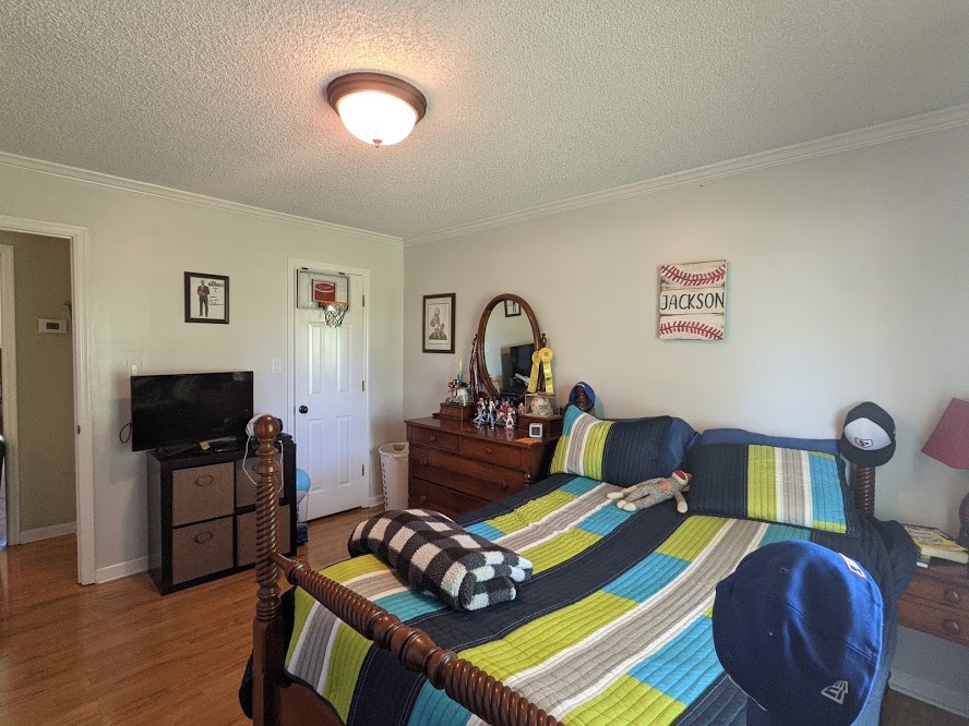 6 Power Station Road Taft, TN 38488 - Photo 26 of 29 a living room with furniture and a flat screen tv