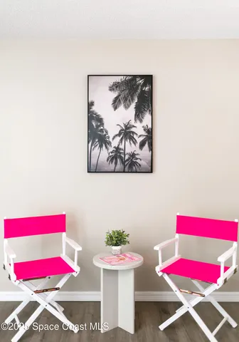 a bedroom with a bed and a mirror