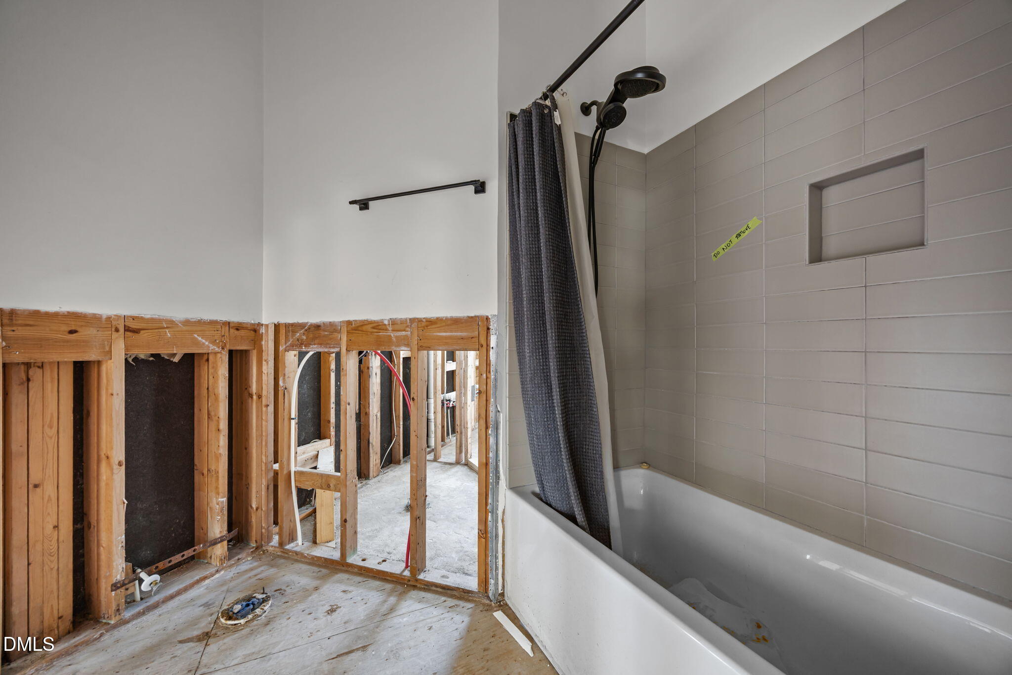 105 Riverbirch Point Carrboro, NC 27510 - Photo 17 of 32 a bathroom with a bathtub and a shower
