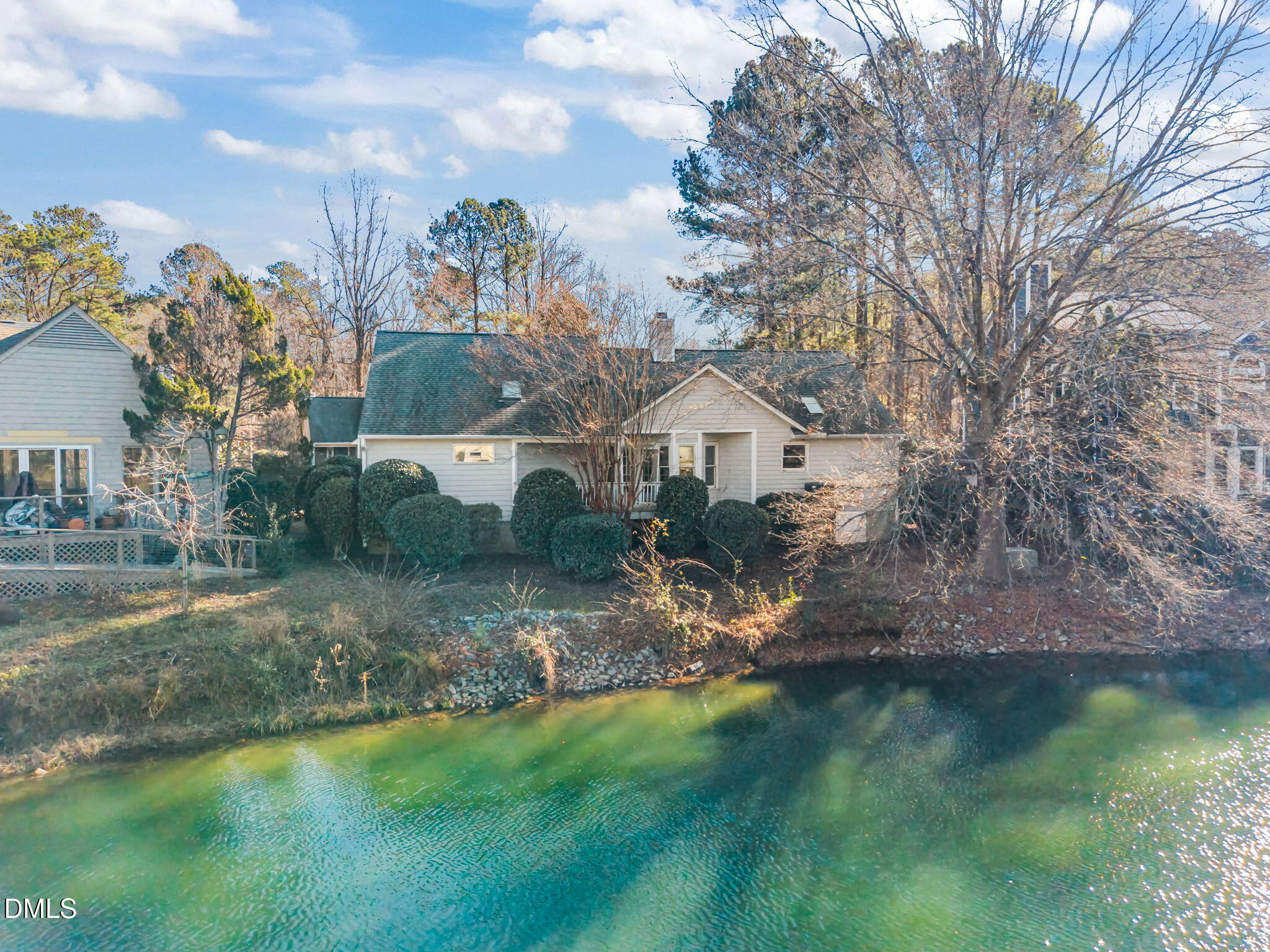 105 Riverbirch Point Carrboro, NC 27510 - Photo 23 of 32 a view of a house with a yard and a fountain