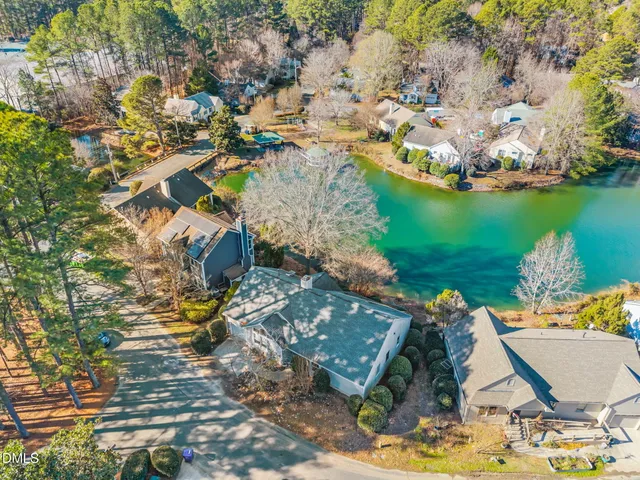 an aerial view of lake residential house with outdoor space