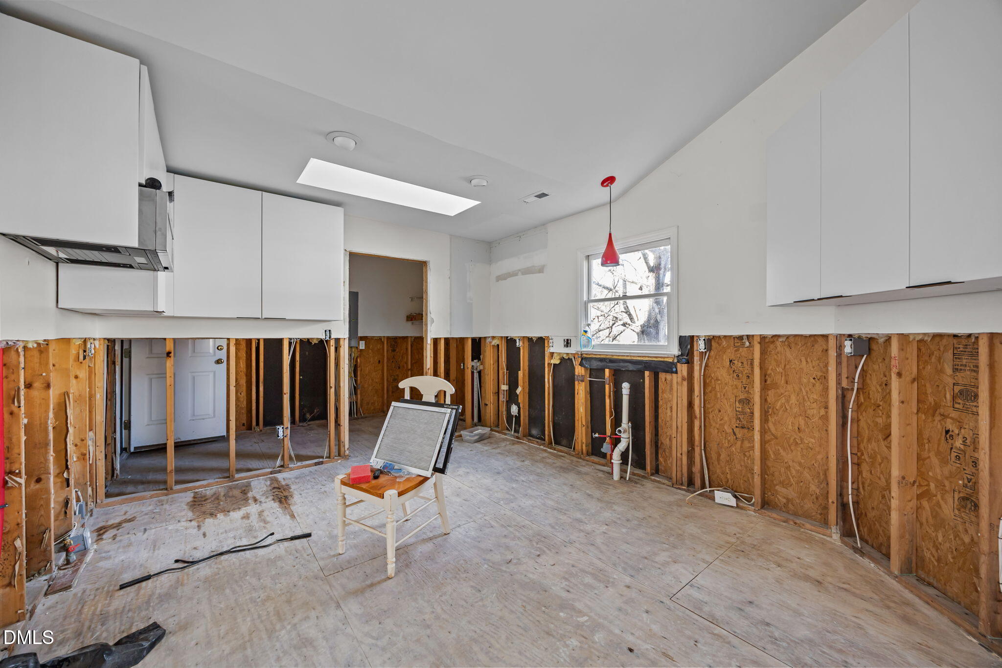 105 Riverbirch Point Carrboro, NC 27510 - Photo 6 of 32 a living room with blue lights with furniture