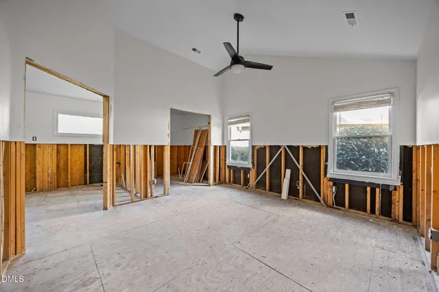 a view of a porch with wooden floor