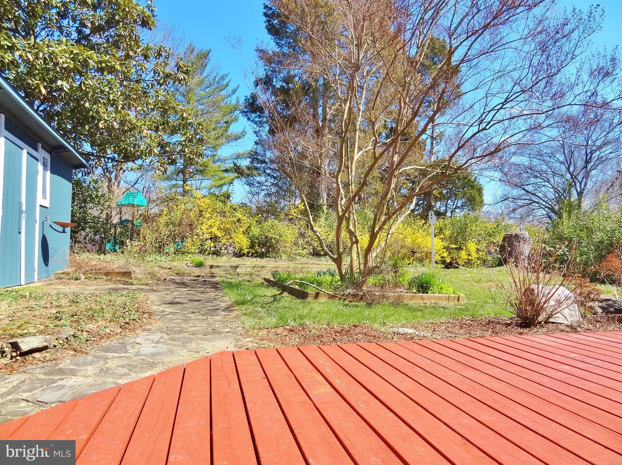 1 Ridge Road, Unit A Greenbelt, MD 20770 - Photo 11 of 13 Fenced Backyard with shed and patio