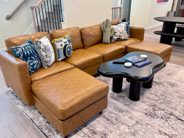 a living room with furniture and a couch