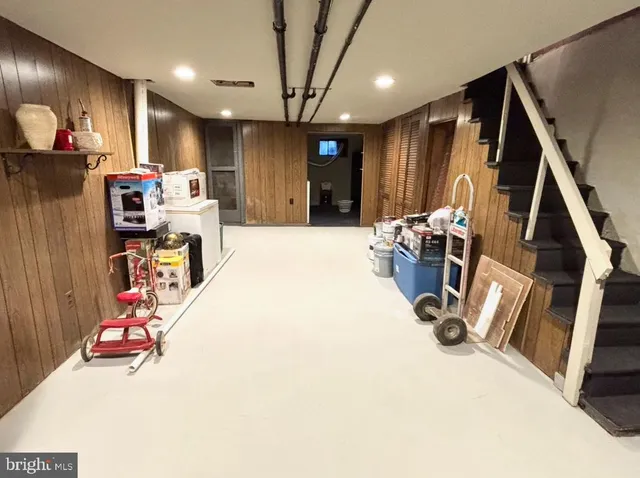 a view of a room with gaming equipment