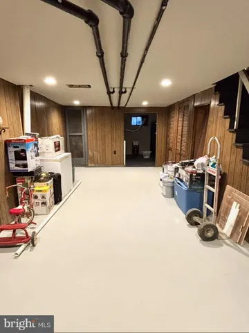 a view of a room with gaming equipment