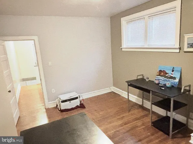 a room with a table and a window