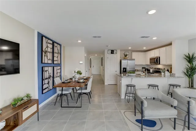 a view of a dining room with furniture