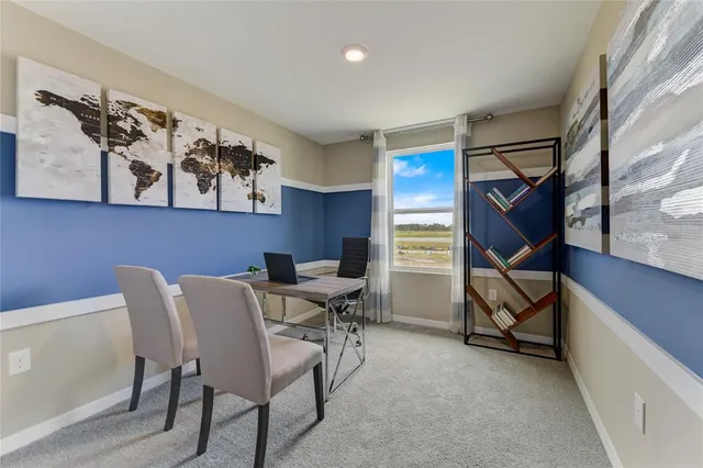 a view of a livingroom with furniture