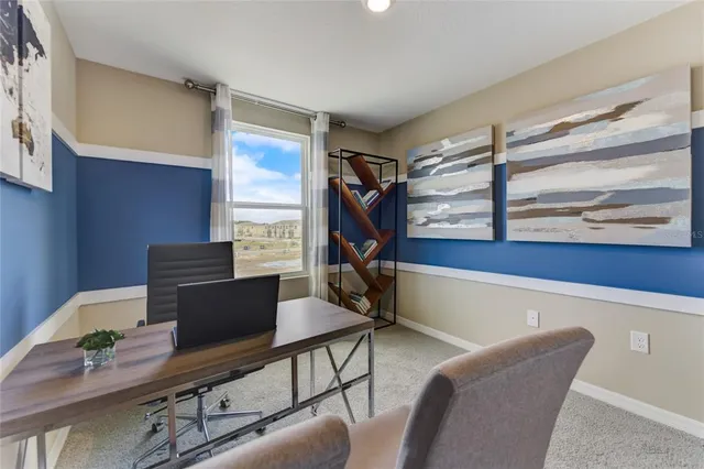 a workspace with furniture and window