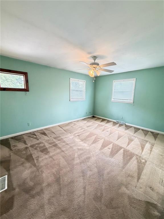 52 Lyons Drive Northwest Rome, GA 30165 - Photo 13 of 34 a bedroom with a bed and a window