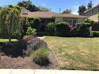 a view of a house with garden