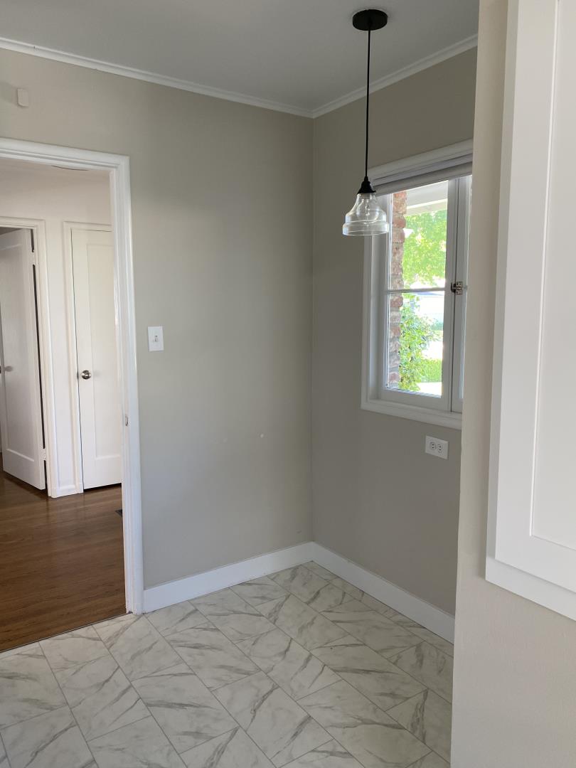 139 Louise Lane San Mateo, CA 94403 - Photo 11 of 11 a view of an empty room with window and cabinet