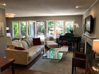 139 Louise Lane San Mateo, CA 94403 - Photo 2 of 11 a living room with fireplace furniture and a flat screen tv