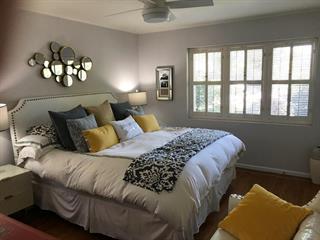 139 Louise Lane San Mateo, CA 94403 - Photo 3 of 11 a bedroom with a bed and a couch