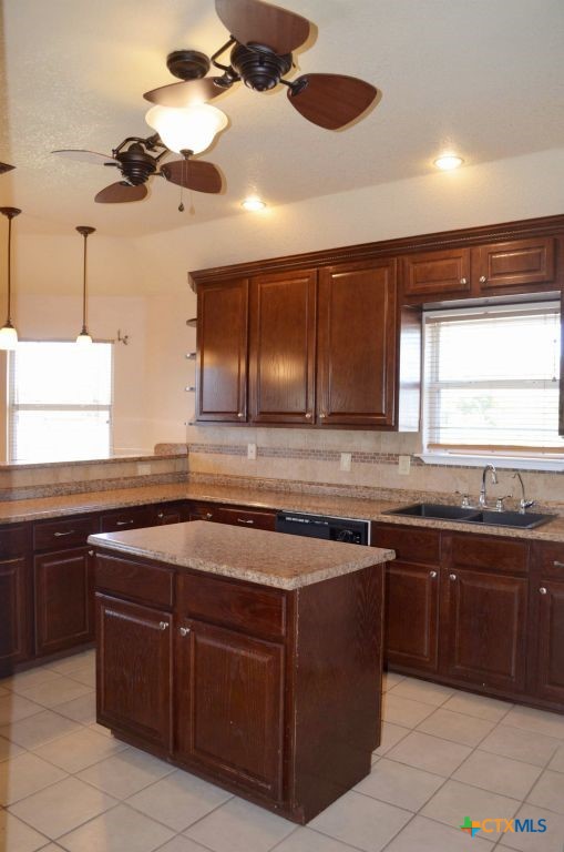 4411 Kit Carson Trail Killeen, TX 76542 - Photo 15 of 45 a kitchen with a sink and a stove