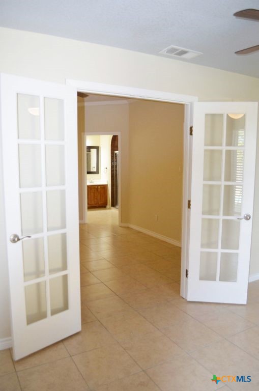 4411 Kit Carson Trail Killeen, TX 76542 - Photo 27 of 45 a view of an empty room with wooden floor and a window