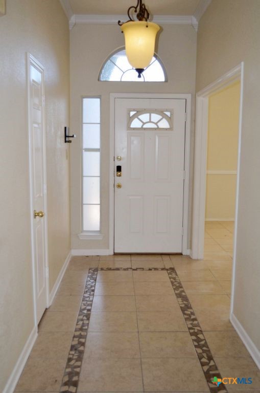 4411 Kit Carson Trail Killeen, TX 76542 - Photo 5 of 45 a view of a hallway with wooden shelves
