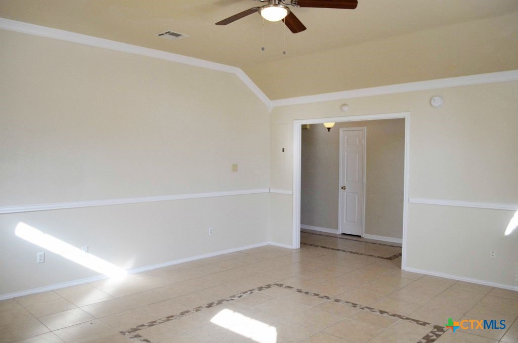 4411 Kit Carson Trail Killeen, TX 76542 - Photo 8 of 45 a view of a livingroom with a ceiling fan and window