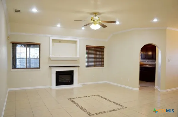 a kitchen with a sink and a stove