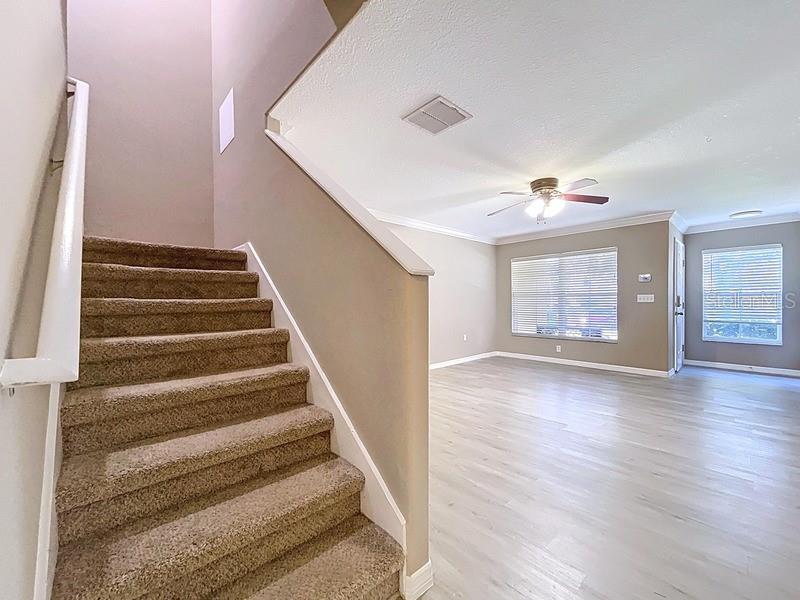 37615 Daliha Terrace Zephyrhills, FL 33542 - Photo 10 of 16 a view of entryway and hall with wooden floor