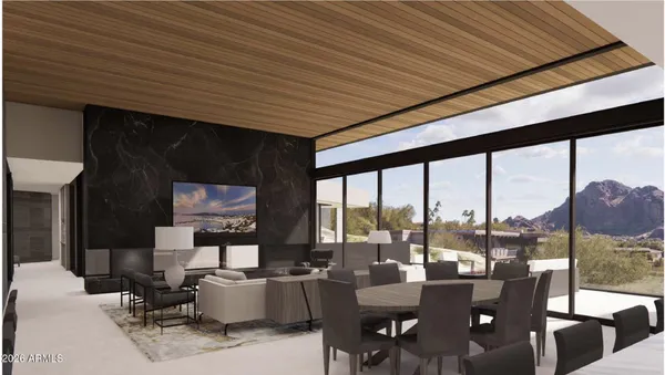 a front view of a house with a yard and parking spaces