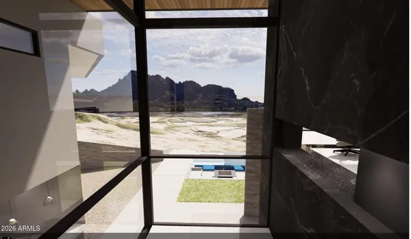 a aerial view of a house with swimming pool and lake view